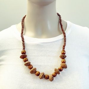 Vintage brown wood & apricot pit beaded necklace